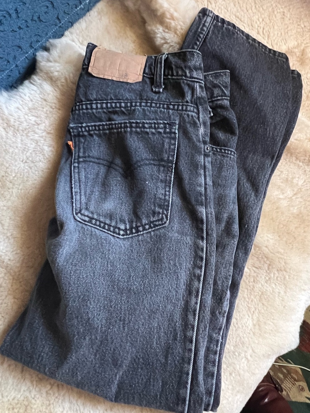 Vintage Levis black straight leg jeans. Orange tag